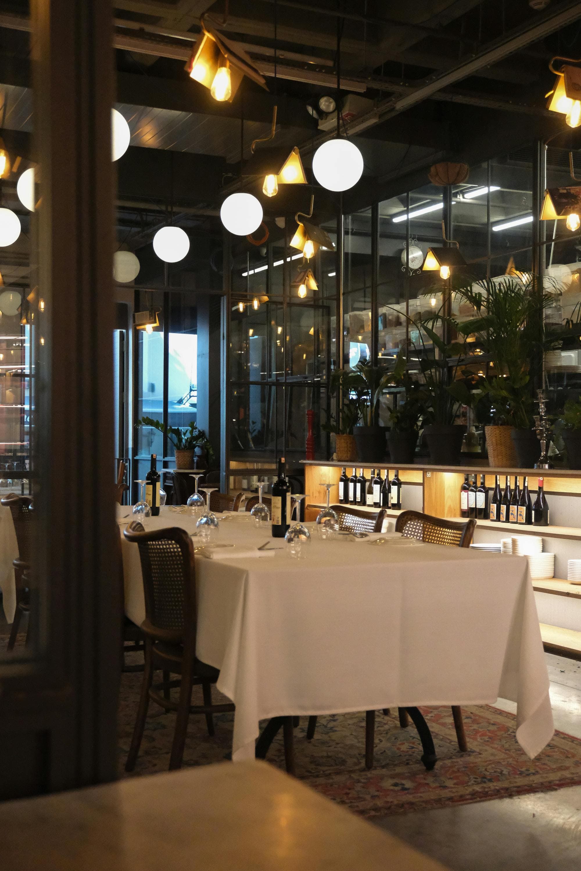 A warm dining room set for the evening